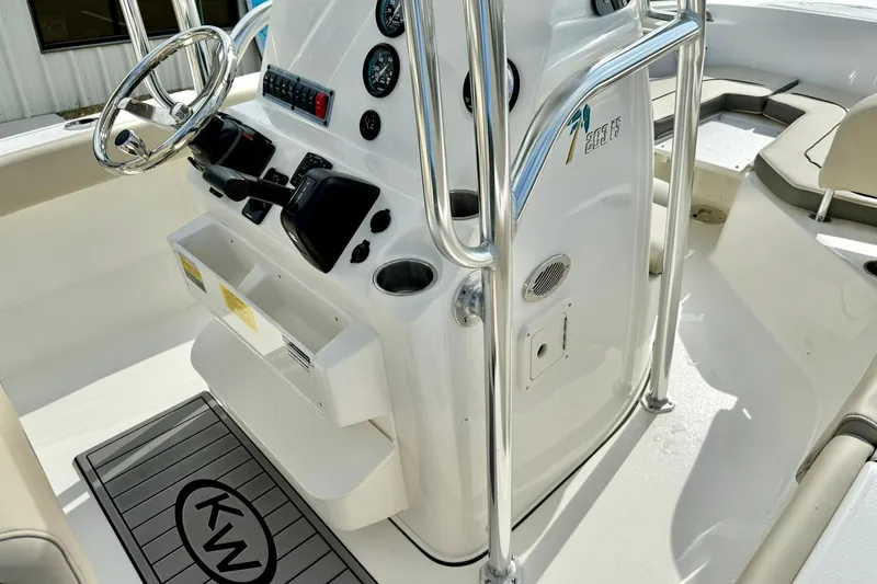 Slide: The Image of 2025 Key West 203 FS boat console with steering wheel and controls. - 20