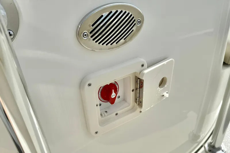 Slide: The Image of 2025 Key West 203 FS boat detail showing speaker and control panel. - 21