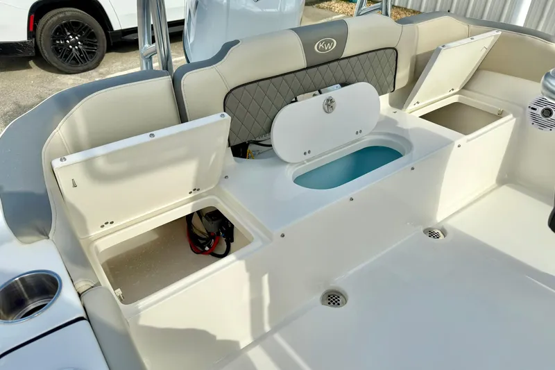 Slide: The Image of 2025 Key West 203 FS boat interior with storage compartments and seating. - 30