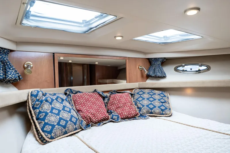 Slide: The Image of Luxurious cabin interior of 2003 Meridian 490 Pilothouse with elegant bedding and skylights. - 30