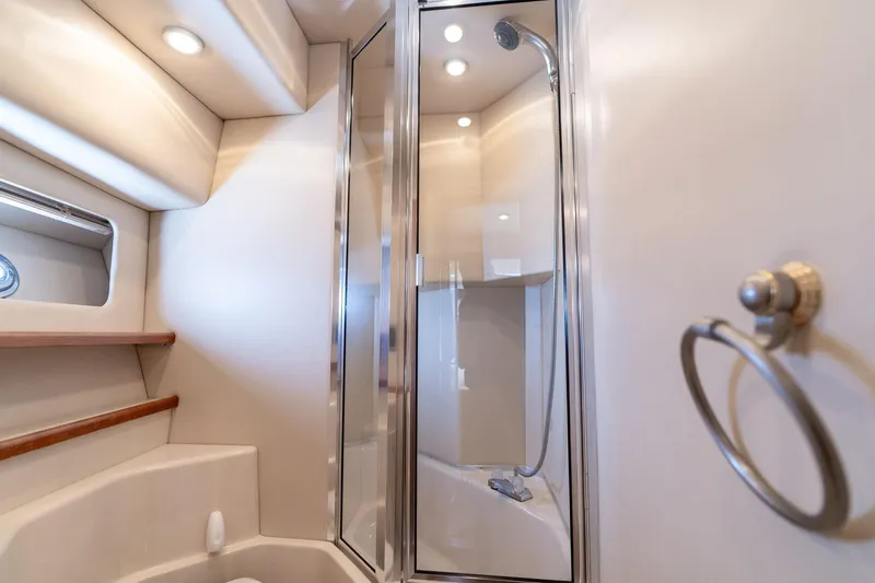 Slide: The Image of Luxurious bathroom in 2003 Meridian 490 Pilothouse yacht with shower and modern fixtures. - 33