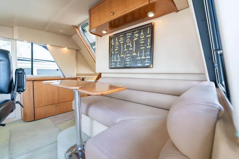 Slide: The Image of Luxurious interior of 2003 Meridian 490 Pilothouse with plush seating and elegant wood finishes. - 38