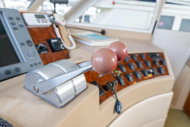 Slide: The Image of 2003 Meridian 490 Pilothouse helm with controls and navigation equipment. - 45