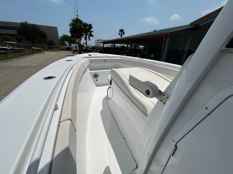 Slide: The Image of 2025 Sea Hunt Gamefish 27 with Coffin Box, showcasing sleek deck design and seating. - 16