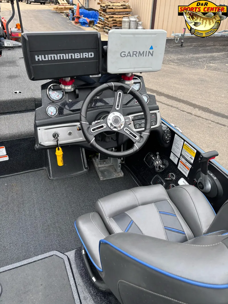 Slide: The Image of 2020 Nitro Z20 boat cockpit with Humminbird and Garmin navigation systems. - 6