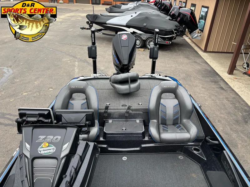 Slide: The Image of Nitro Z20 boat interior with dual seats and control panel, displayed at D&R Sports Center. - 7