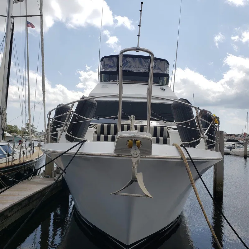 Slide: The Image of 1988 Viking 55 Motoryacht Walkaround docked at marina, front view. - 4
