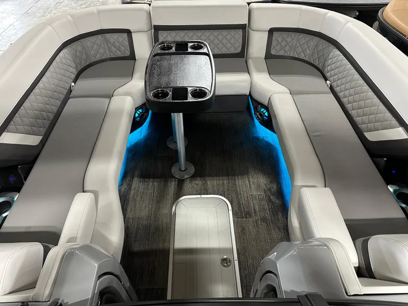 Slide: The Image of Luxurious seating area of 2025 Godfrey AquaPatio 255 SFLW with ambient blue lighting. - 22