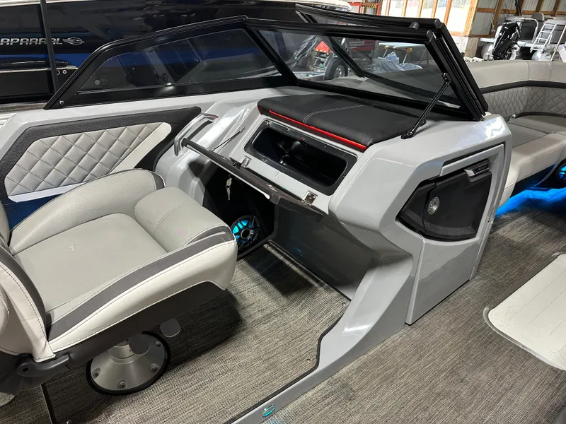 Slide: The Image of 2025 Godfrey AquaPatio 255 SFLW boat interior with modern helm and seating. - 28