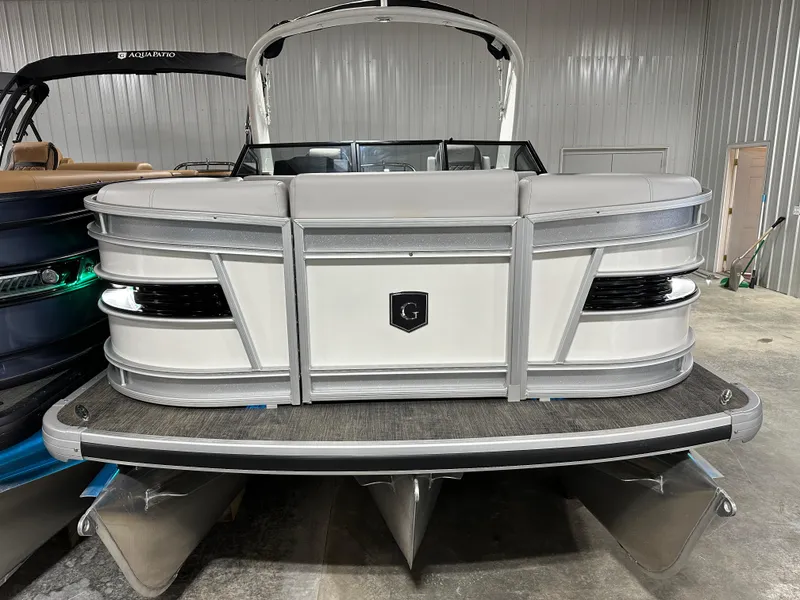 Slide: The Image of 2025 Godfrey AquaPatio 255 SFLW pontoon boat in a showroom, front view. - 35