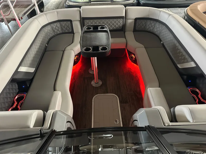 Slide: The Image of 2025 Godfrey AquaPatio 255 SFLW interior with red LED lighting and luxurious seating. - 39
