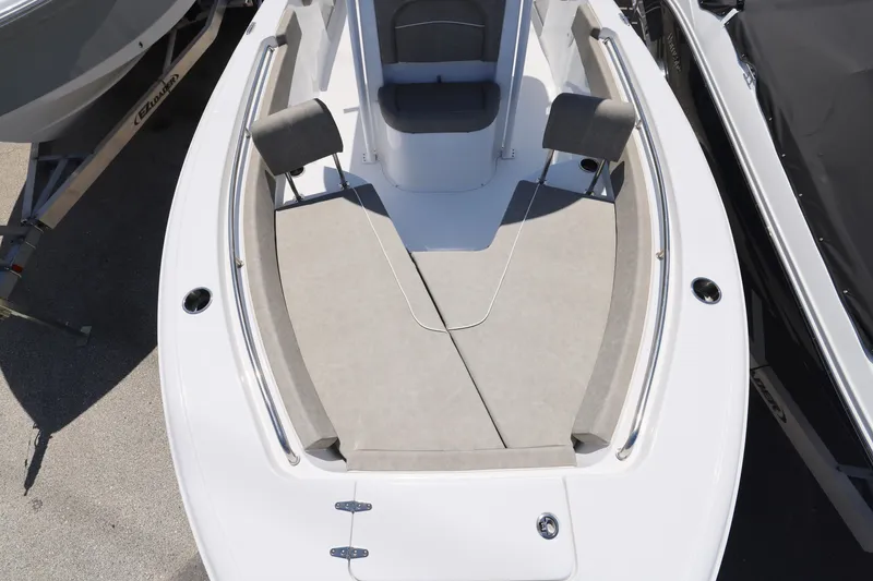 Slide: The Image of 2025 Sea Hunt Ultra 229 boat, spacious bow seating, sleek design. - 11