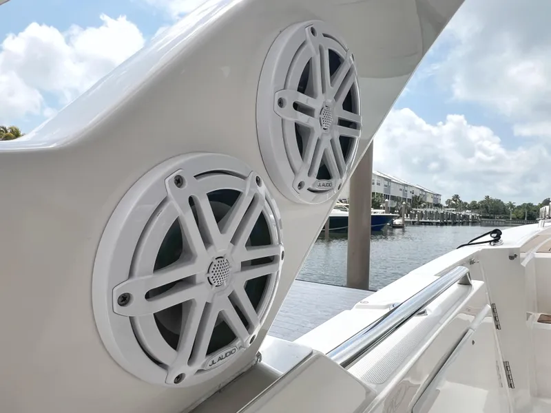 Slide: The Image of 2023 Tiara Yachts 38 LS boat speakers with waterfront view. - 10