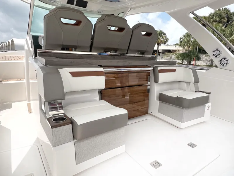 Slide: The Image of 2023 Tiara Yachts 38 LS interior with luxurious seating and modern design. - 11