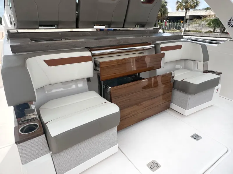 Slide: The Image of 2023 Tiara Yachts 38 LS interior with luxurious seating and modern design. - 15