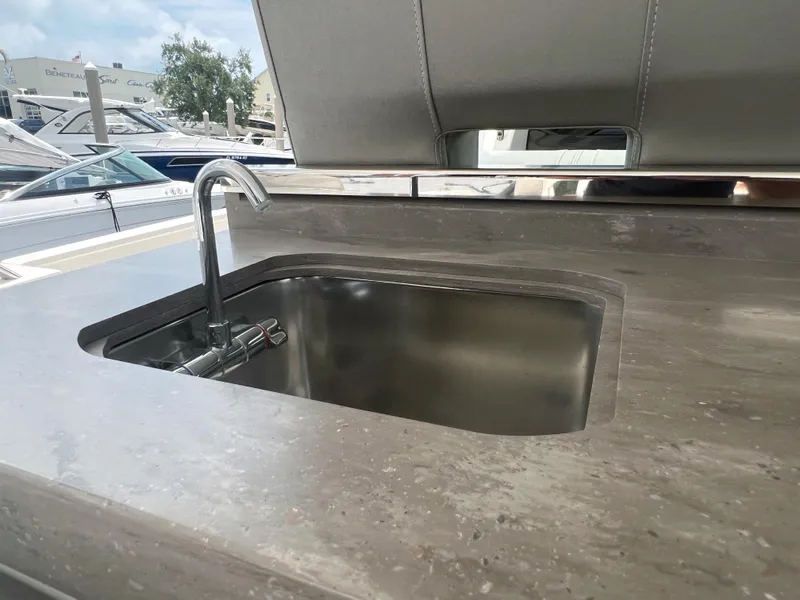 Slide: The Image of 2023 Tiara Yachts 38 LS featuring a sleek onboard sink design. - 16