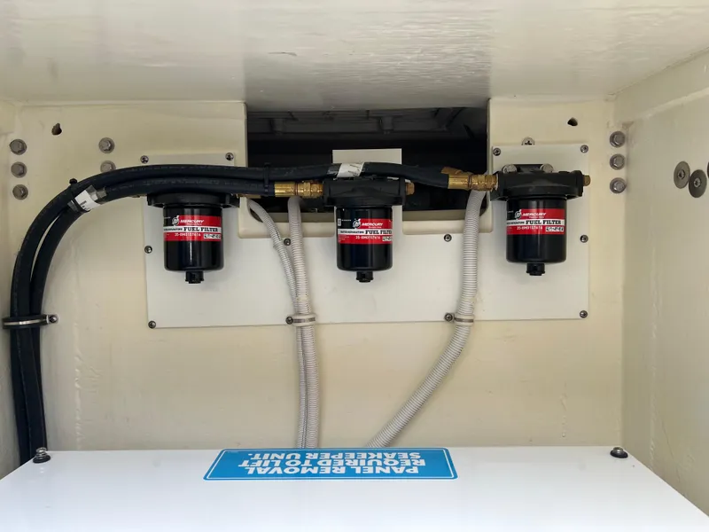 Slide: The Image of Fuel filters in the engine compartment of a 2023 Tiara Yachts 38 LS. - 23