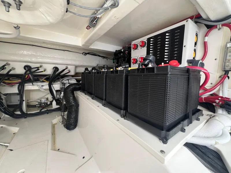Slide: The Image of Battery compartment of 2023 Tiara Yachts 38 LS, showcasing electrical systems and wiring. - 25