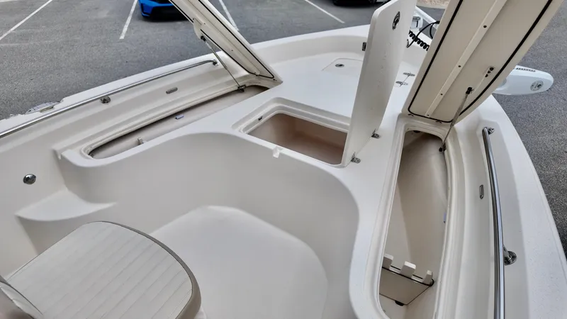 Slide: The Image of 2018 Sea Chaser LX 21 boat interior with open storage compartments. - 8