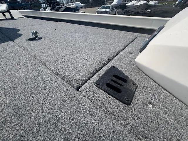 Slide: The Image of 2024 Ranger RT188 boat deck with gray carpet and hardware. - 20