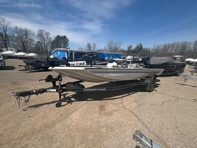 Slide: The Image of 2024 Ranger RT188 boat on trailer in outdoor lot, clear sky background. - 4