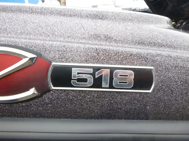 Slide: The Image of 2023 Ranger Z518 emblem on a metallic surface. - 2