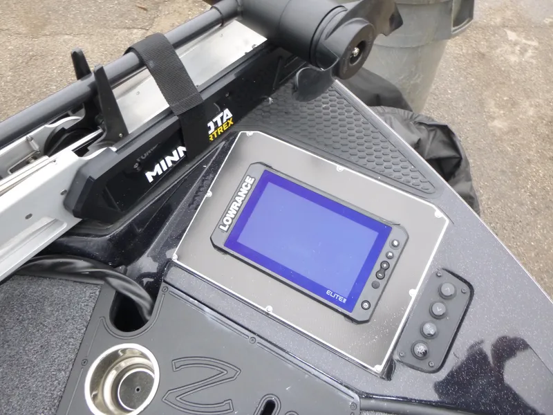 Slide: The Image of 2023 Ranger Z518 boat dashboard with Lowrance Elite fish finder and Minn Kota trolling motor. - 8