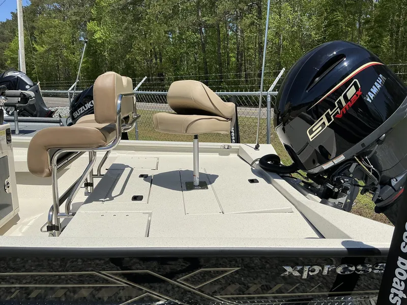 Slide: The Image of 2025 Xpress Hyper-Lift Series H22B boat with Yamaha engine and seating. - 7