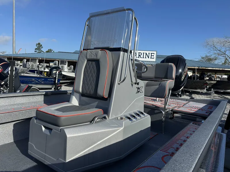 Slide: The Image of 2025 Xpress Hyper-Lift Series H22B boat with sleek seating and modern design. - 5