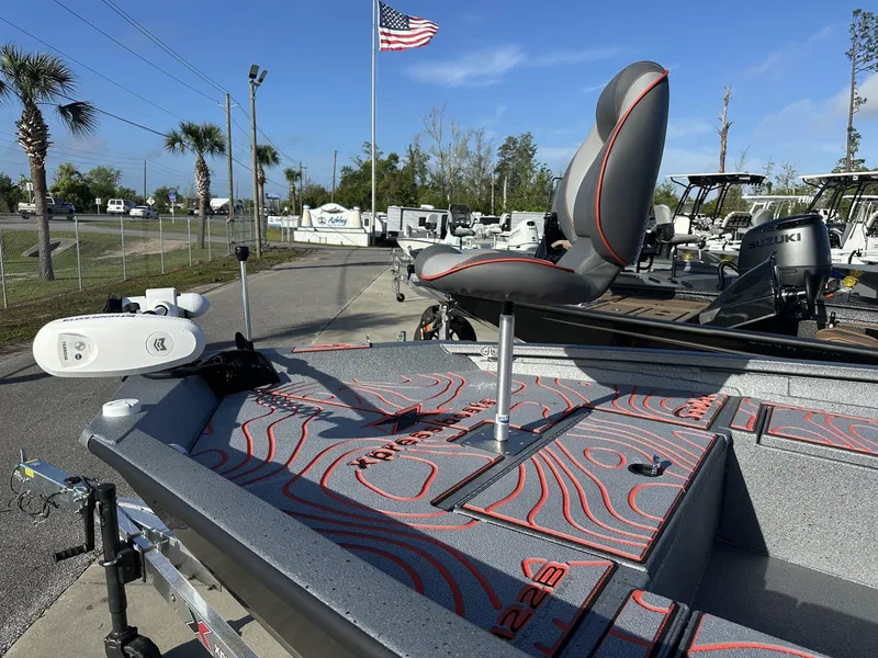 Slide: The Image of 2025 Xpress Hyper-Lift Series H22B boat with stylish seating and advanced equipment. - 7