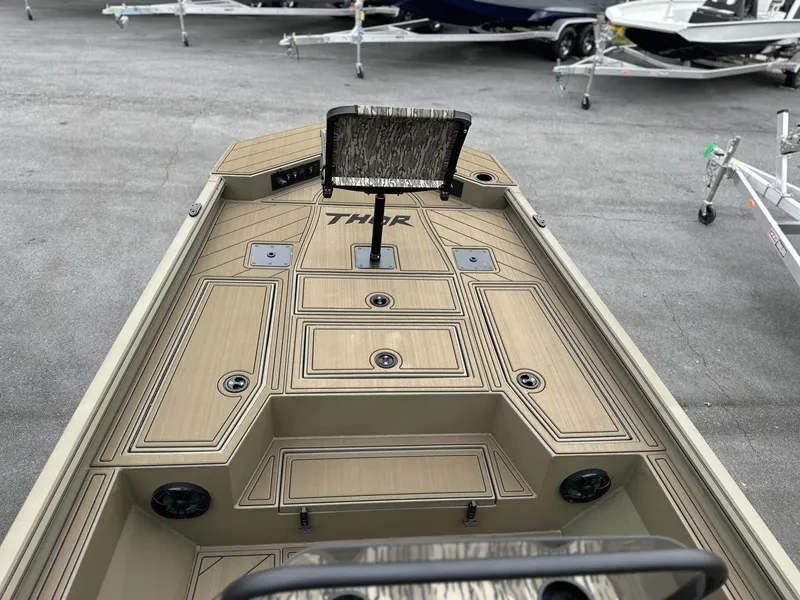 Slide: The Image of 2025 Thor LAKE HAMMER 1900 CC boat deck with sleek design and modern features. - 2