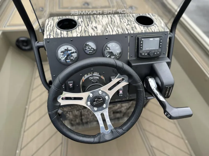 Slide: The Image of Steering console of 2025 Thor LAKE HAMMER 1900 CC boat with gauges and controls. - 7
