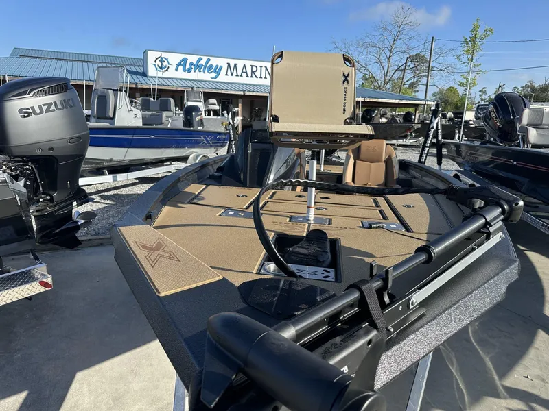 Slide: The Image of 2025 Xpress Hyper-Lift H18 Crappie boat at Ashley Marine dealership. - 2