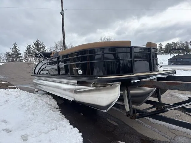 Slide: The Image of 2025 Harris CRUISER 230 SLDH pontoon boat on trailer in snowy landscape. - 4