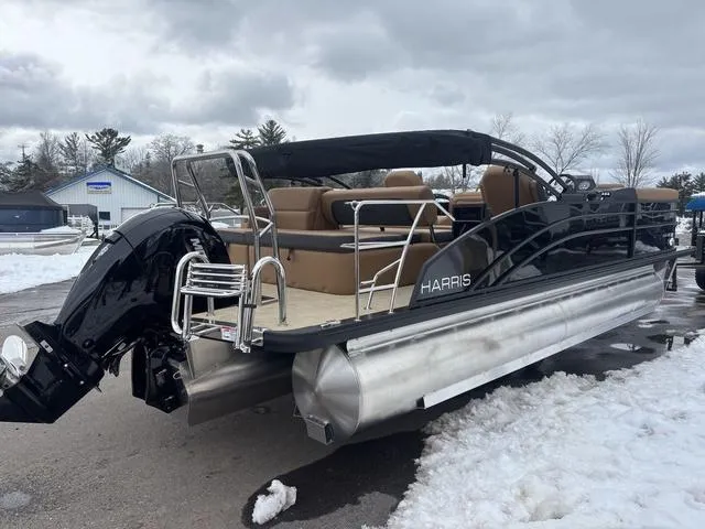 Slide: The Image of 2025 Harris CRUISER 230 SLDH pontoon boat on snowy dock, featuring sleek design and modern amenities. - 6