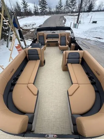 Slide: The Image of 2025 Harris CRUISER 230 SLDH pontoon boat with luxurious tan seating in snowy landscape. - 9