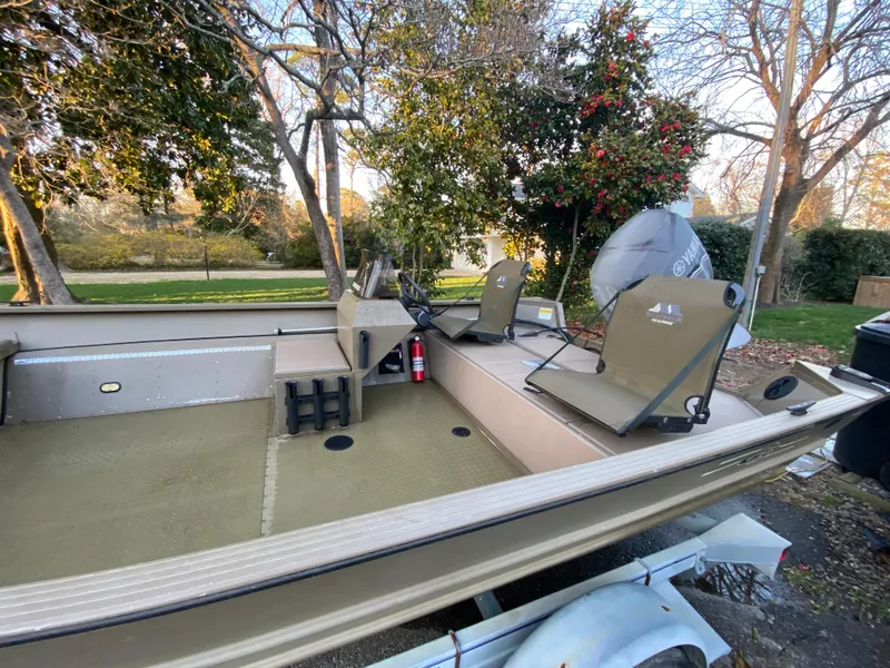 Slide: The Image of Aluminum fishing boat G3 1966 CC, 2007 model, on trailer in a wooded area. - 3