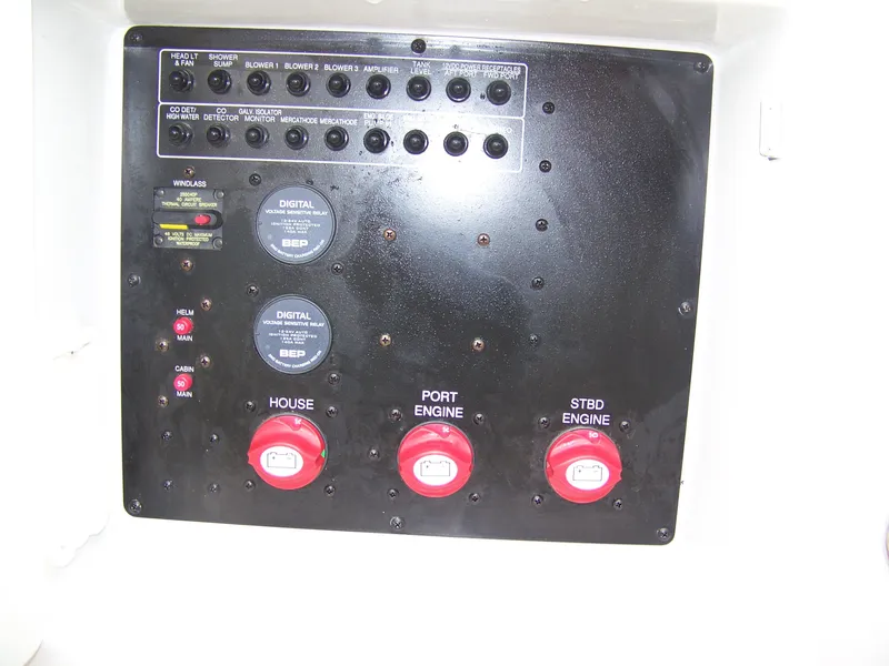 Slide: The Image of Control panel of a 2020 Crownline 350 SY boat with engine switches and digital displays. - 16