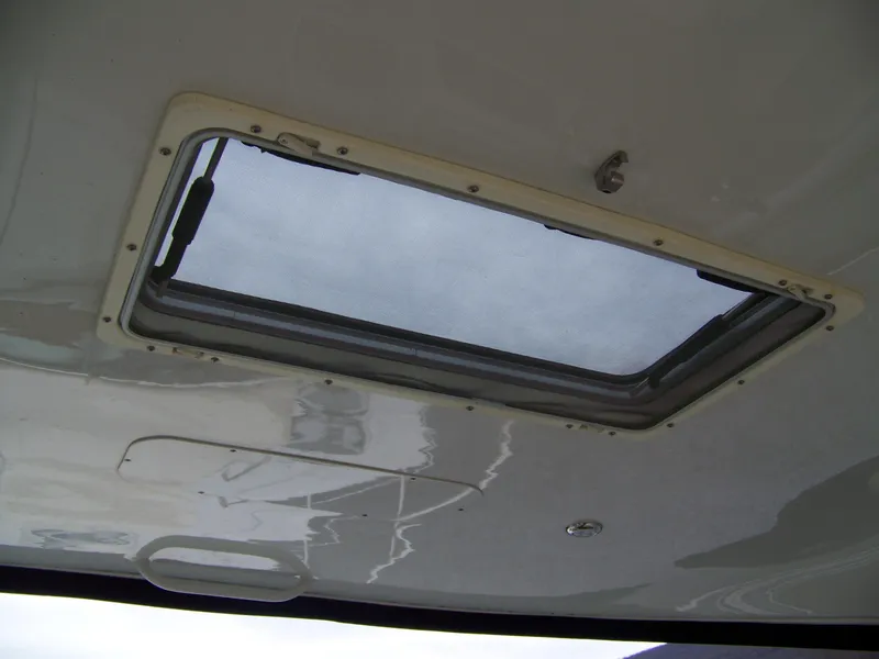 Slide: The Image of Hatch window on 2020 Crownline 350 SY boat ceiling. - 17
