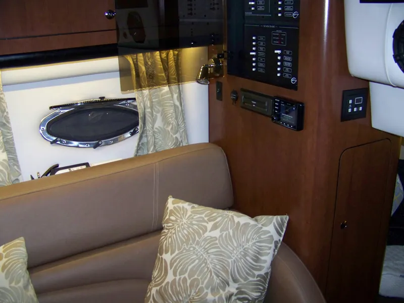 Slide: The Image of Interior of 2020 Crownline 350 SY yacht with plush seating and control panels. - 28