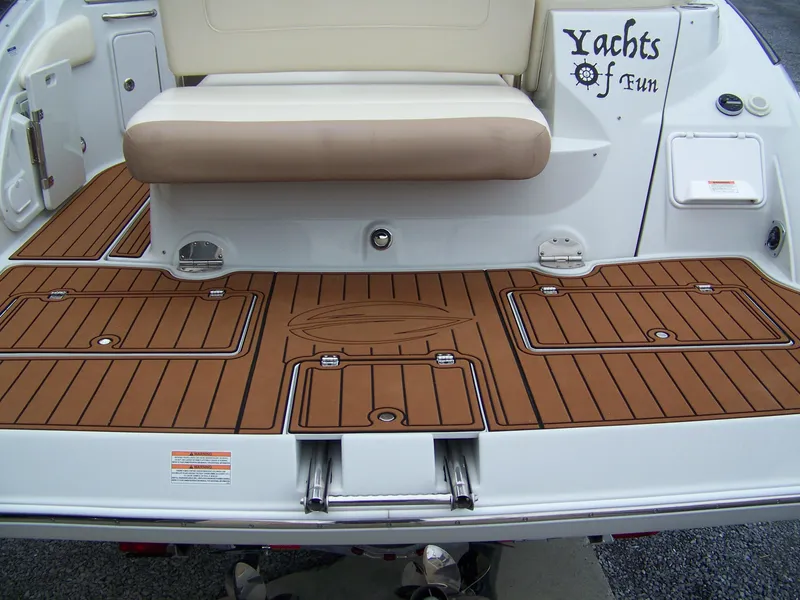 Slide: The Image of 2020 Crownline 350 SY yacht with teak deck and cushioned seating. - 3