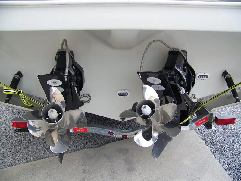 Slide: The Image of Dual propellers of a 2020 Crownline 350 SY boat on a trailer. - 4