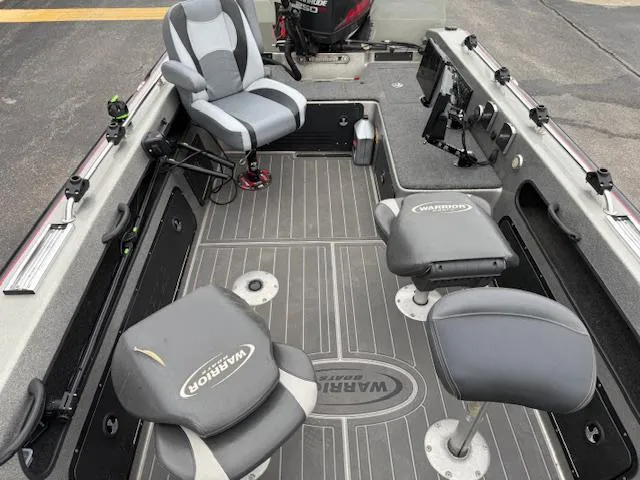 Slide: The Image of 2016 Warrior V2090 boat interior with seating and fishing equipment. - 10