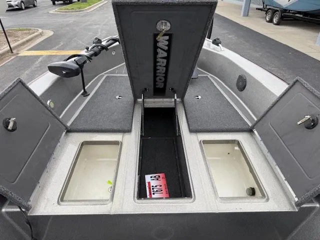 Slide: The Image of 2016 Warrior V2090 boat storage compartments open, showcasing interior layout and design. - 7