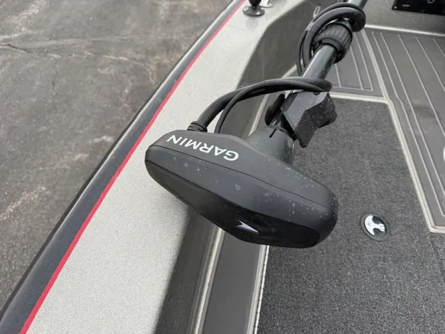 Slide: The Image of Garmin device on 2016 Warrior V2090 boat deck, featuring sleek design and advanced technology. - 8