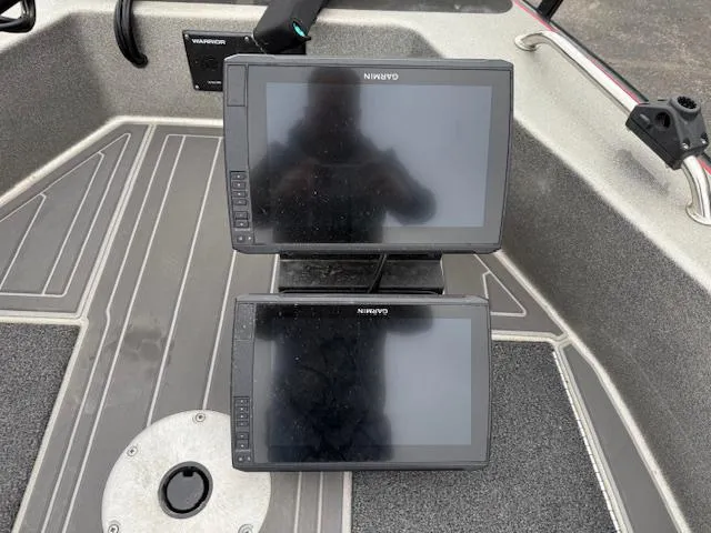 Slide: The Image of 2016 Warrior V2090 boat with dual Garmin displays on deck. - 9