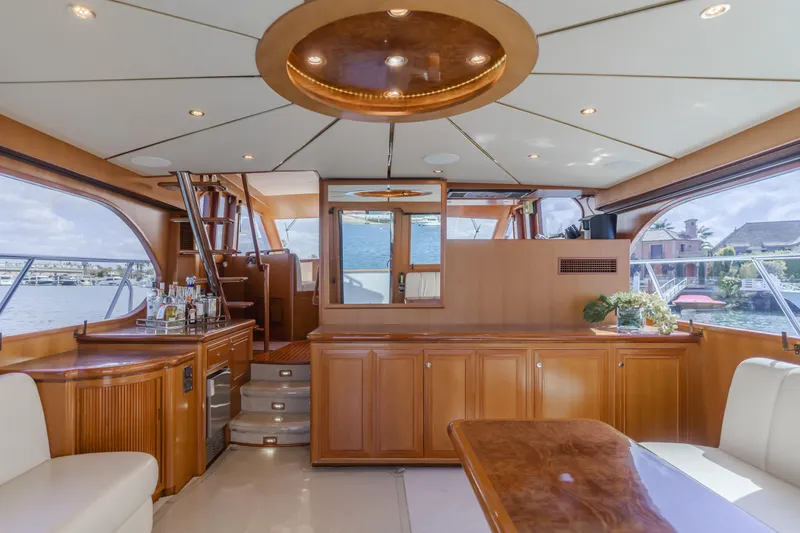 Slide: The Image of Luxurious interior of 2005 Ocean Alexander 548 Pilothouse yacht with elegant wood finishes. - 22