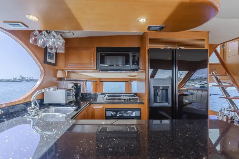 Slide: The Image of Luxurious kitchen interior of 2005 Ocean Alexander 548 Pilothouse yacht with modern appliances. - 27