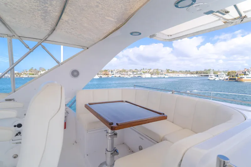 Slide: The Image of Luxurious 2005 Ocean Alexander 548 Pilothouse yacht with elegant seating and scenic ocean view. - 32