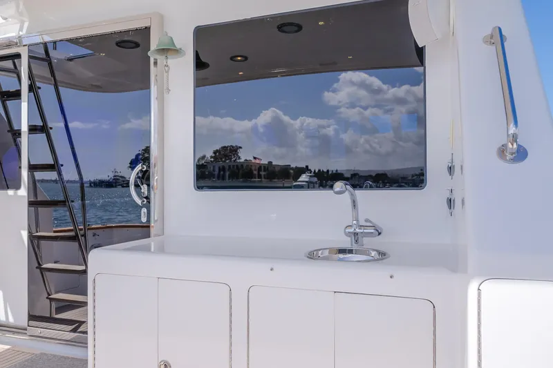 Slide: The Image of 2005 Ocean Alexander 548 Pilothouse yacht with outdoor sink and scenic water view. - 37